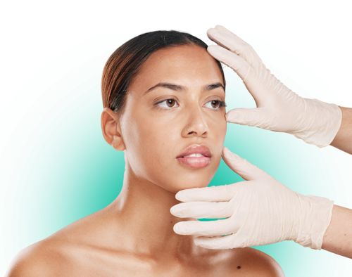 A plastic surgeon completes an assessment during an aesthetic appointment