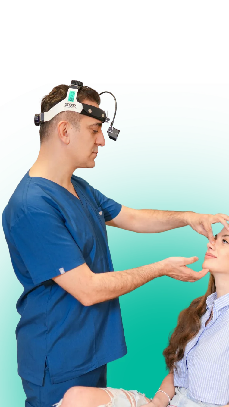 Plastic surgeon examining a patient during consultation